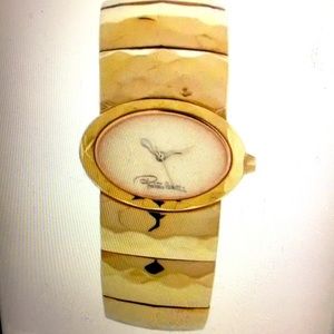 Roberto Cavalli gold watch with Tag.